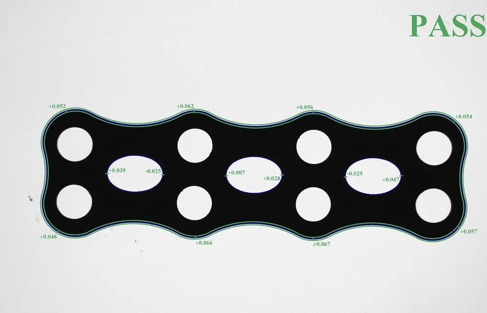 A medical plate under automatic medical device inspection, receiving a pass result, along with labels of its tolerances.