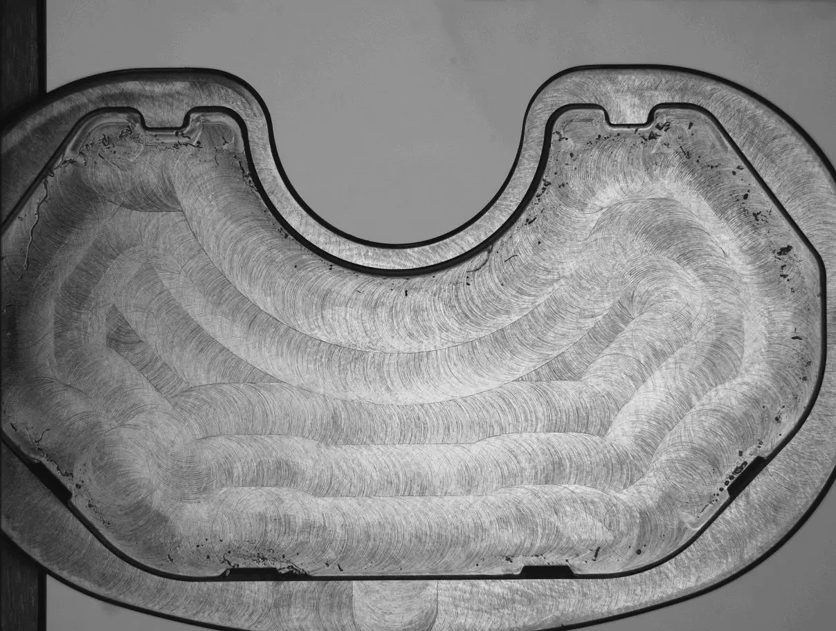 a tibial plate with coax illumination at 10x magnification captured with a VisionGauge digital optical comparator system
