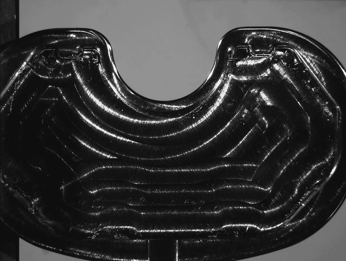 a tibial plate with regular illumination at 10x magnification captured with a VisionGauge digital optical comparator system
