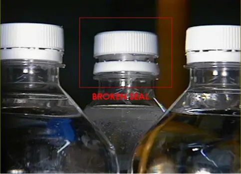 inspection reporting a broken seal on a bottle cap