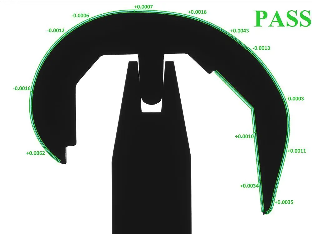 A condyle implant passing inspection with VisionGauge and displaying control section measurement points