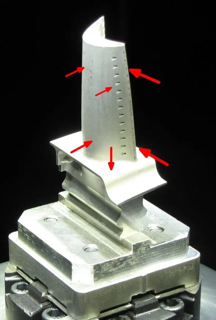 a mounted part with arrows showing the faces for the VisionGauge 6-point nest reorientation tool