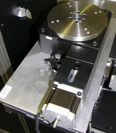 a rotary stage mounted on a VisionGauge digital optical comparator stage