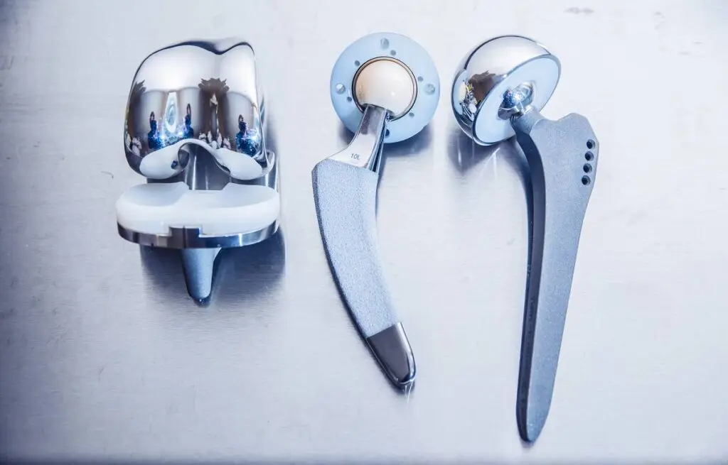 A set of hip and knee medical replacement implant parts, all made in acceptable tolerances through exact medical device inspections with VisionGauge